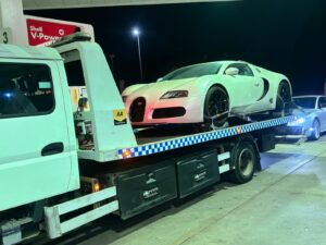 ARB Vehicle Recovery London flatbed tow truck executing a legal lift and shift transport operation